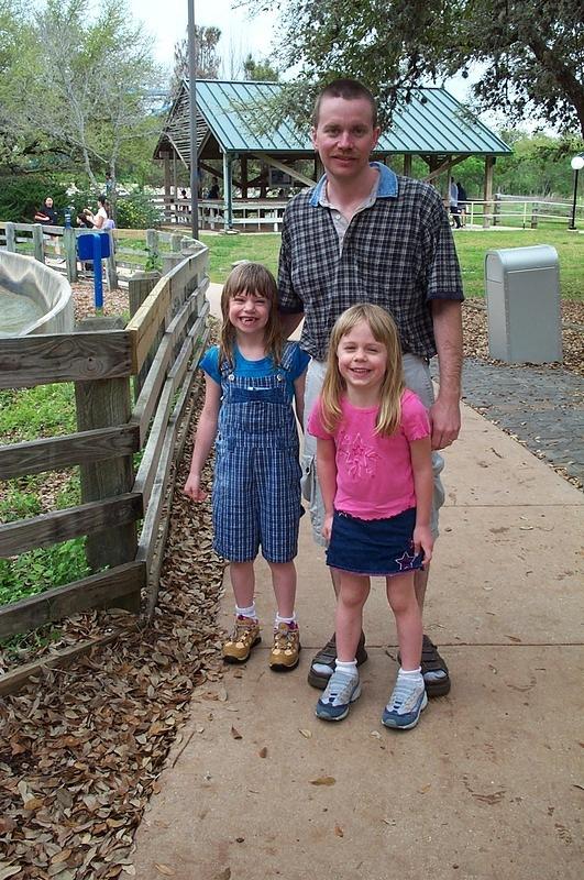 The wet husband and kids after riding a water ride