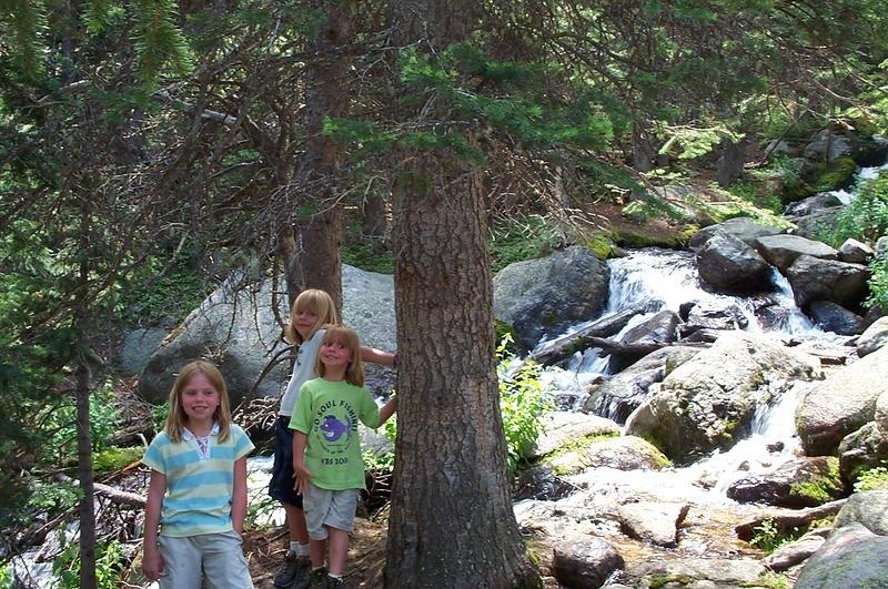 The girls having fun during a break on the hike up to the campsite.