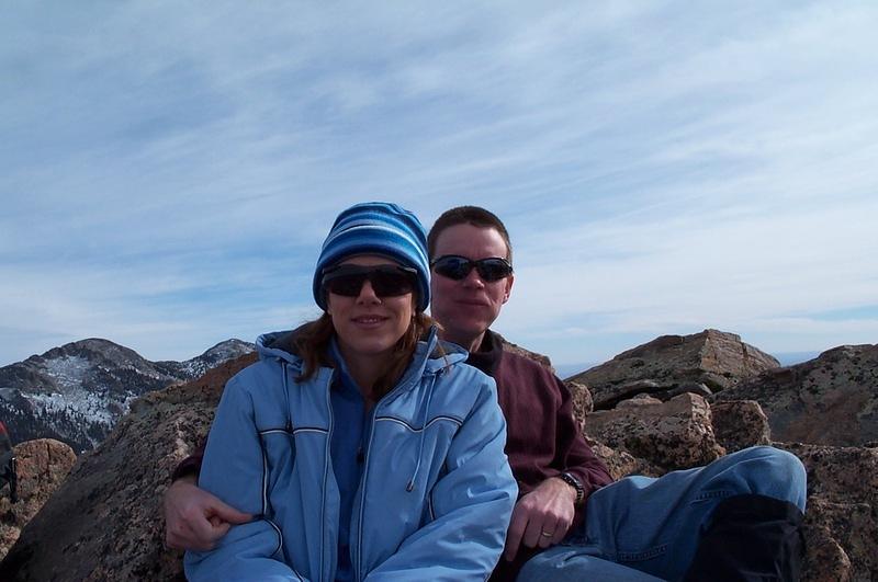 Us enjoying the beautiful winter? day on the summit.  Actually we needed the rest, the last part of the trail is BRUTAL!!