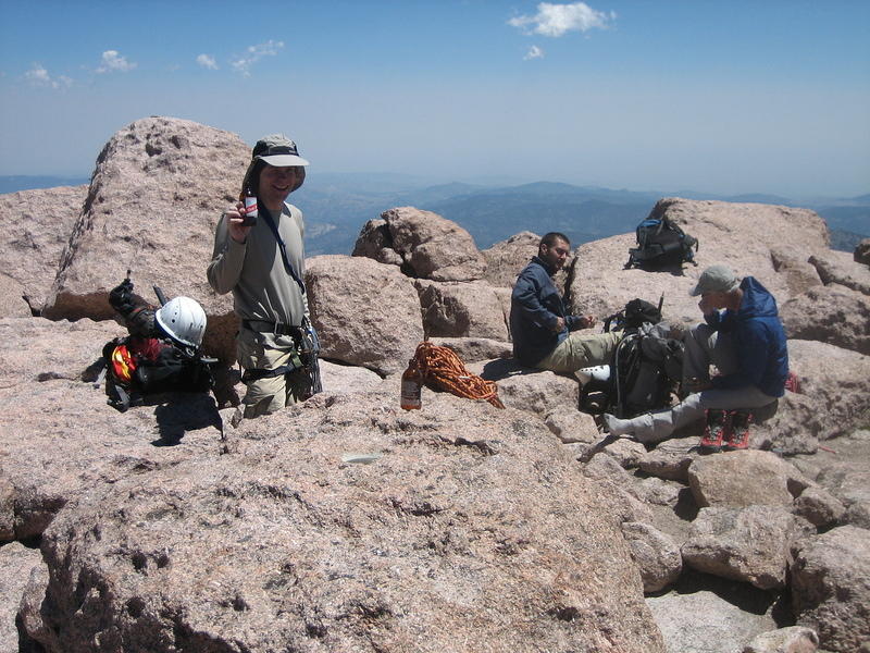 Me enjoying a little refreshment on the summit.  The CMS guide is on the right and his client is in the middle.