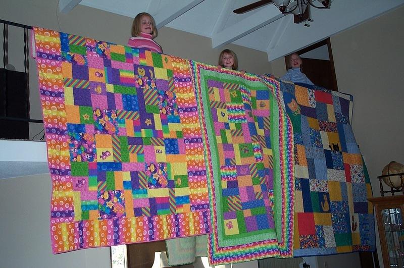 All together now-then it was off to remake their beds.  It's bad luck to have a quilt that has never been slept under.