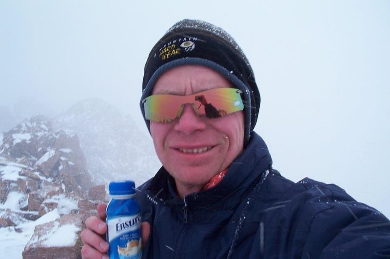 Me on the summit of Storm - I was feeling a little bit old at this point so I switched beverages.