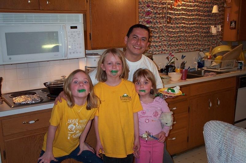 Aunt Melanie knows how to have fun.  She put frosting on the girls' lips.  They should have kissed Victor afterwards.