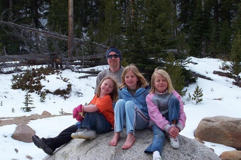 Alan and the girls on a rock by the bridge where the trail splits off to go up to Ypsilon.  Elizabeth really wanted to wade.