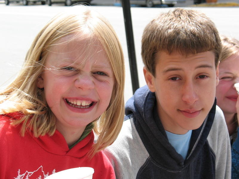 Hannah and Christian eat snow cones downtown