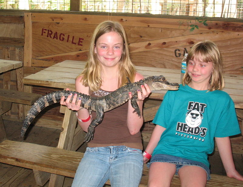 Eliz with gator, Rebecca wasn't going to touch it