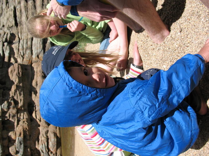 Benjamin digs in the sand