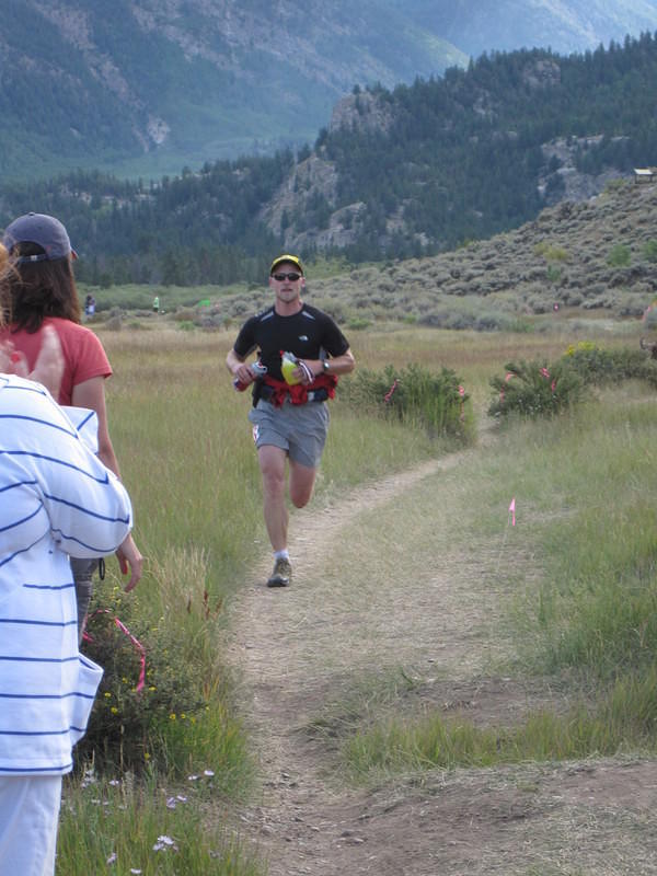 Mark runs ahead to fill water bottles