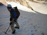 Me taking a break halfway up Lamb's slide.  The expression was from the pain caused by the angle and my strap-on crampons.