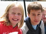 Hannah and Christian eat snow cones downtown