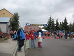 Here are the kids waiting for him at the finish line it was right before 9 am.  