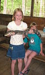 Hannah holds the baby gator