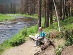 Hannah takes a break by the water